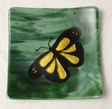 Golden Butterfly on green plate